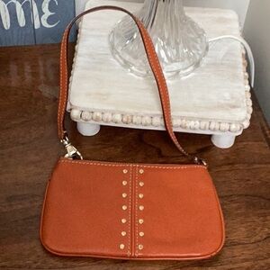 Michael Kors orange, gold tone Studded wristlet, clutch, zipper pouch